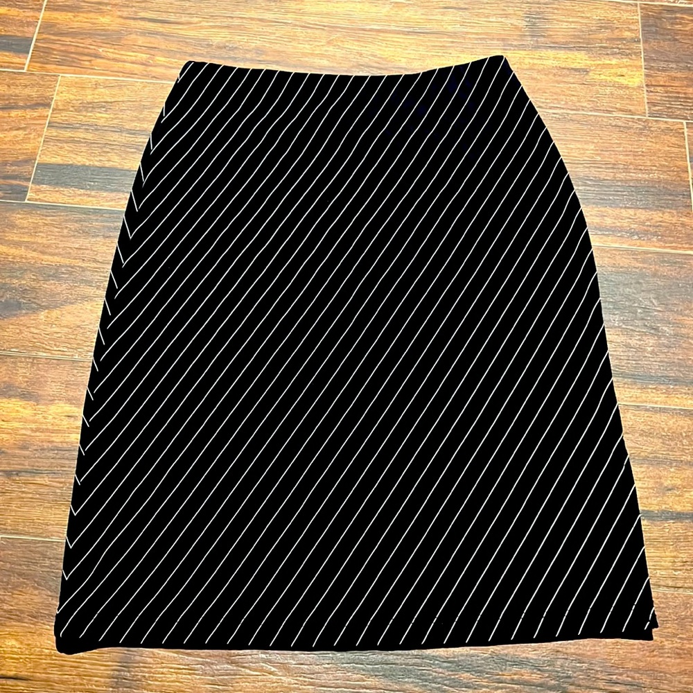 Black kneelength skirt with white pinstripes